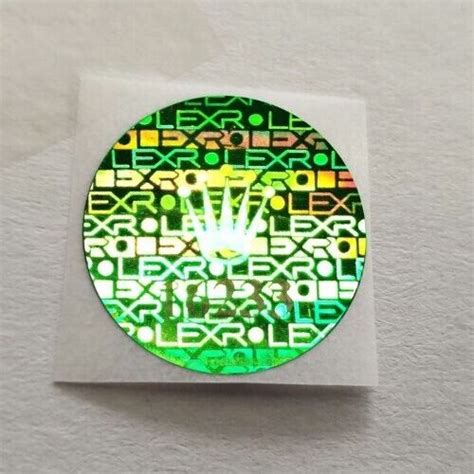 green hologram sticker on caseback